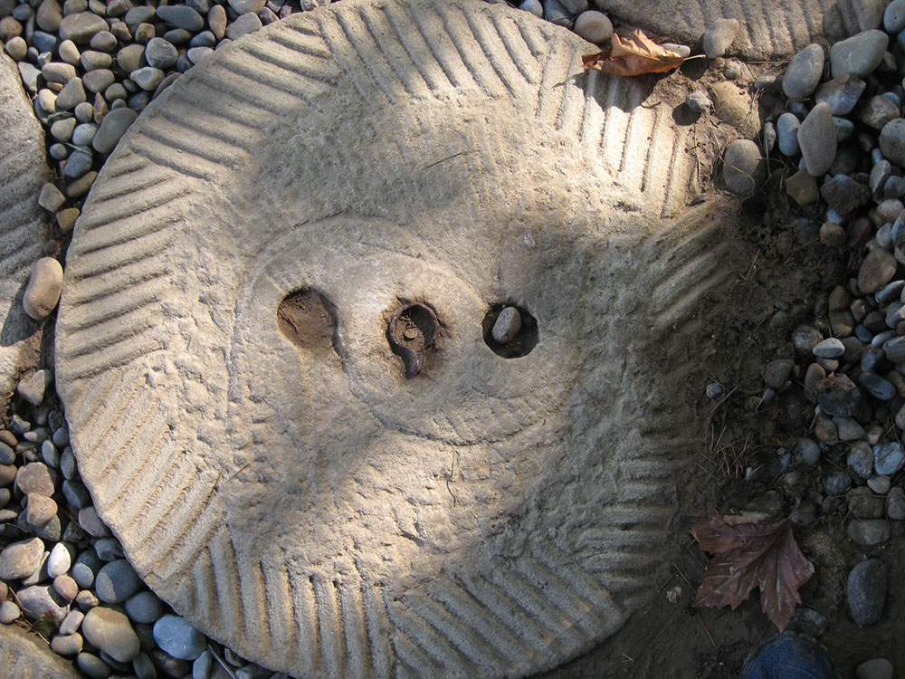 石磨盘上的阴阳鱼——农耕文化中的美学探索